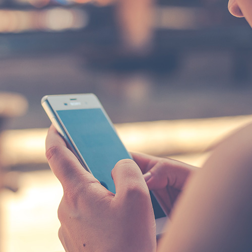 woman checking her phone