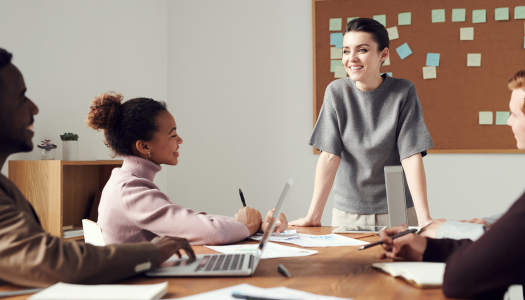 A woman conducting a meeting